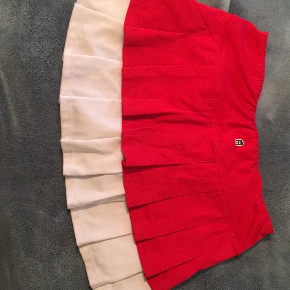 2 skirts with shorts underneath!!